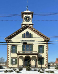 Acton Town Hall facade on a snow covered day.